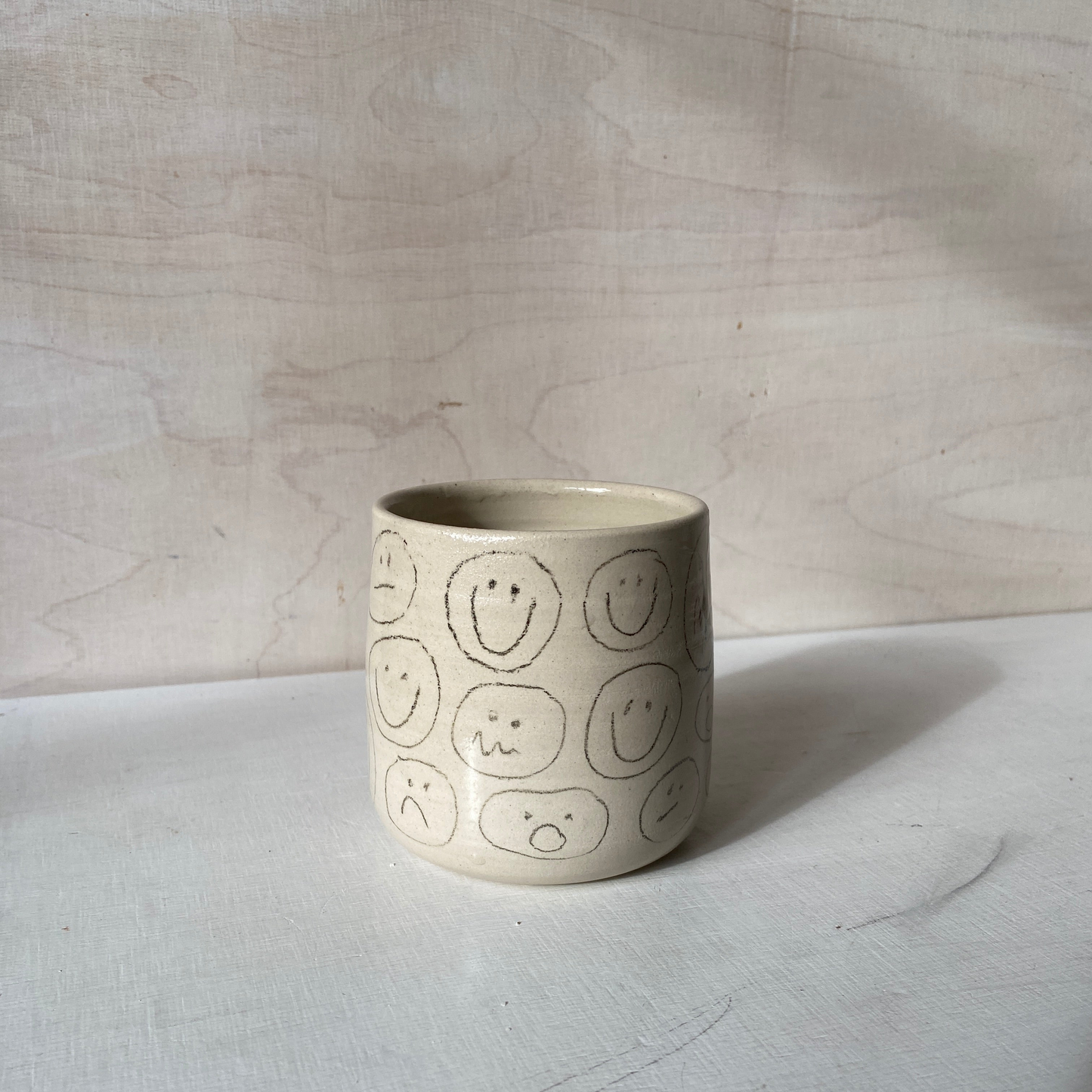 Nudie Smiley Becher