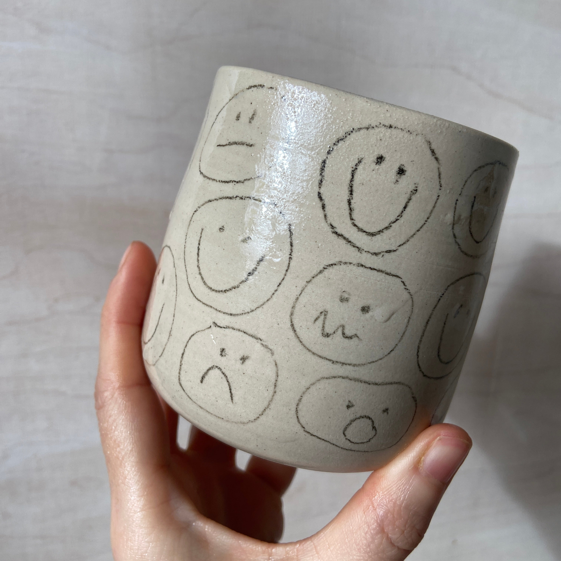 Nudie Smiley Becher